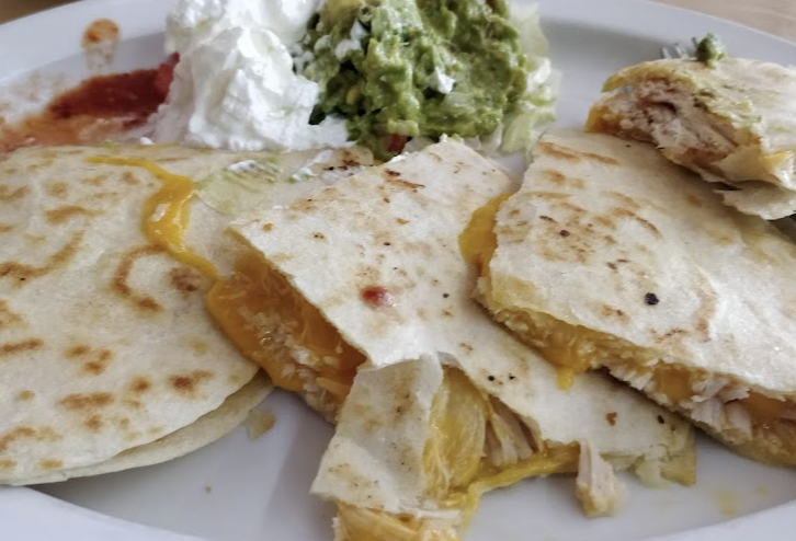 El Comal signature dishes SopapillasChicken Fajita SaladQuesadillas